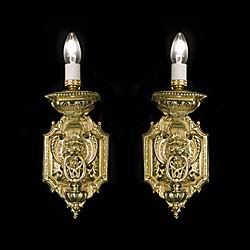  A pair of large Baroque style antique wall lights