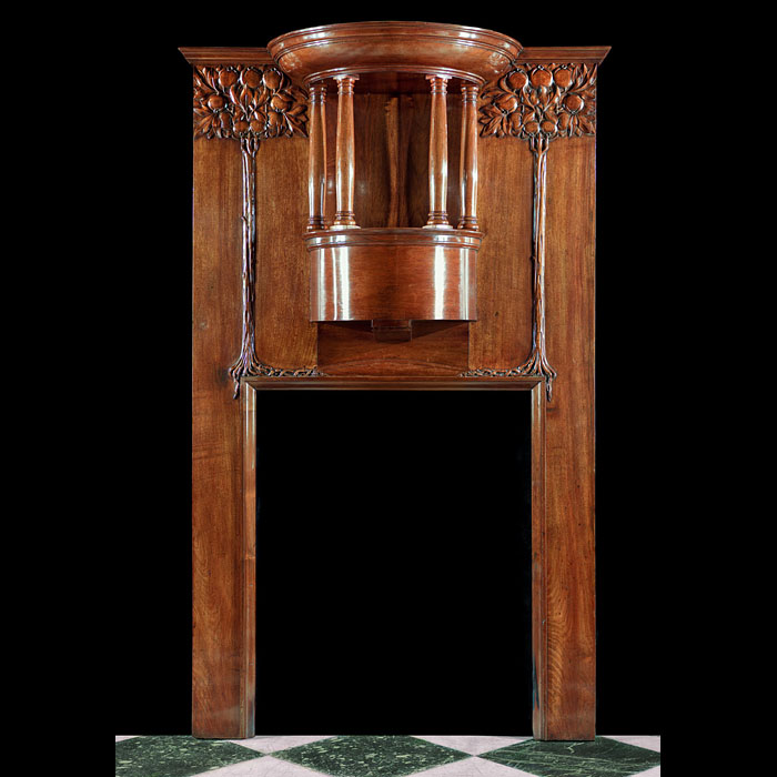 An Antique Art Nouveau Walnut Fire Surround