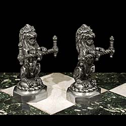 A Pair of Lion Form Antique Fire Tool Rests.