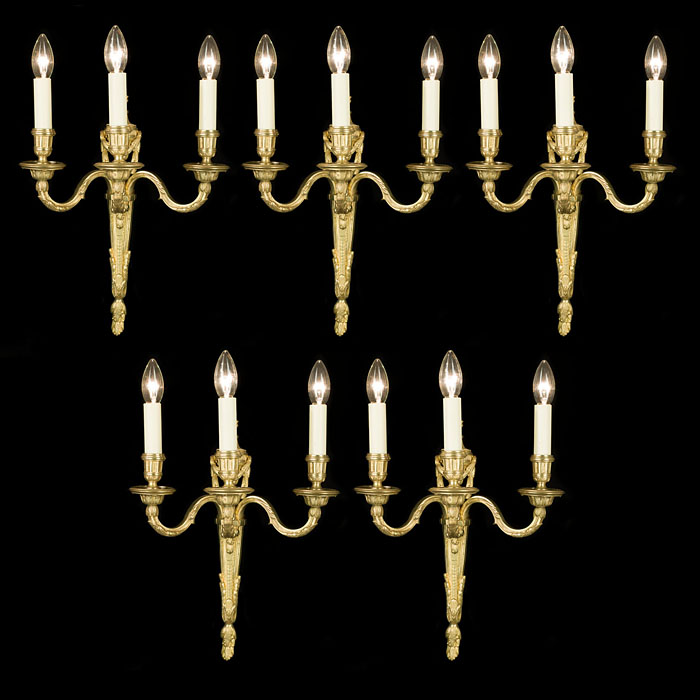 A set of five 20th century gilt brass wall lights