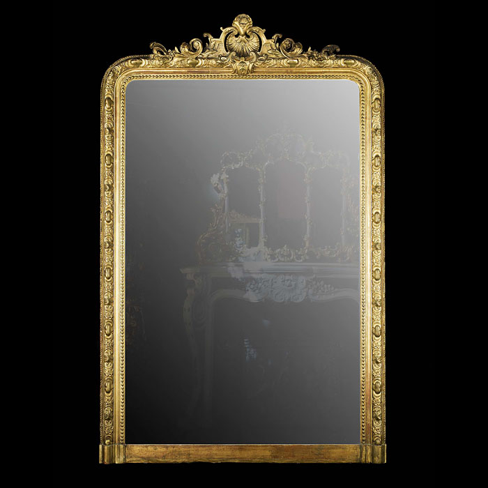 A French gilt and gesso antique overmantel mirror   