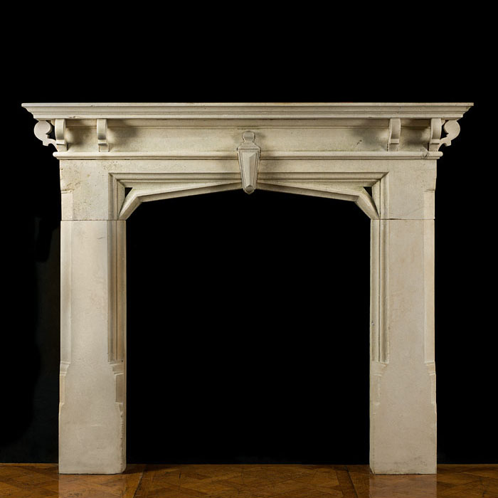 A Limestone Gothic Revival Antique Fireplace