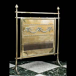 An Antique Edwardian brass fire screen