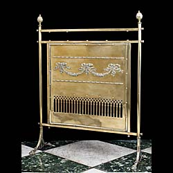 An Antique Edwardian brass fire screen