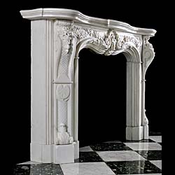 An antique Statuary Marble Rococo style fireplace surround