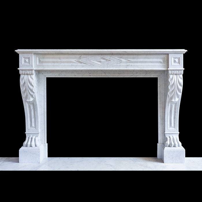 A French Louis XVI Style Lion Paw Carrara Marble Fireplace