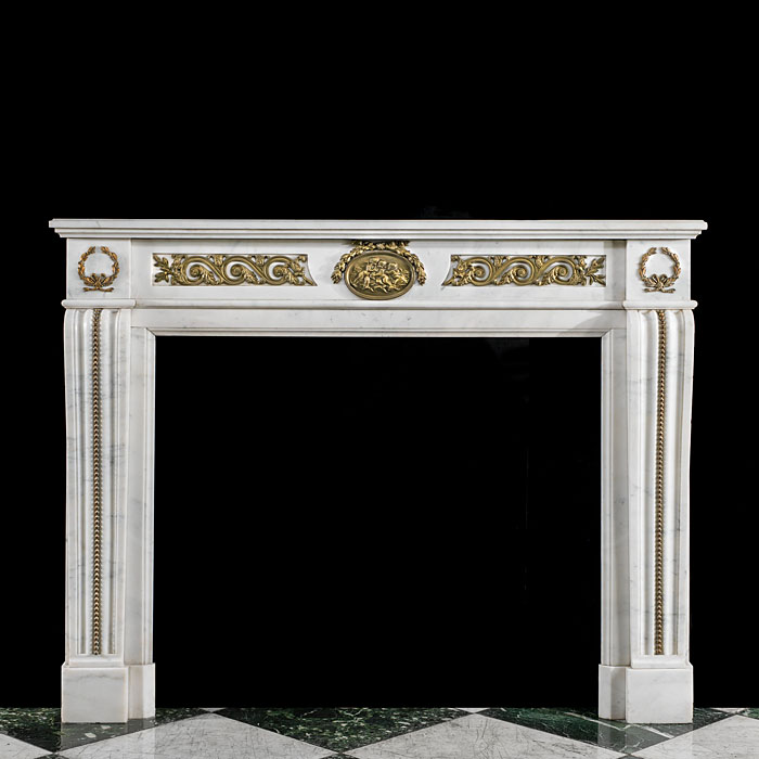 A Louis XVI Statuary Marble fire surround