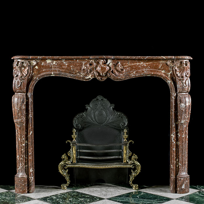  An antique French Rouge Royale marble chimneypiece   