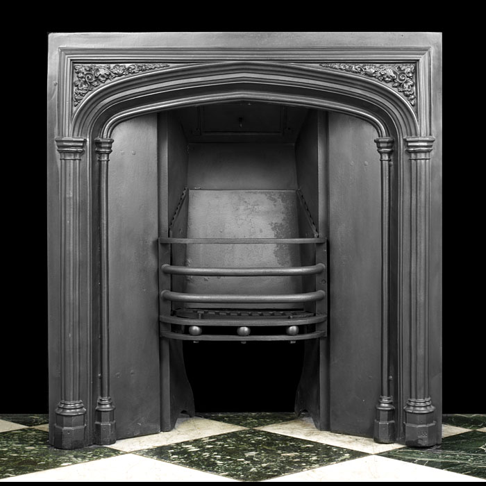  A Late Georgian Cast Iron Fireplace Insert