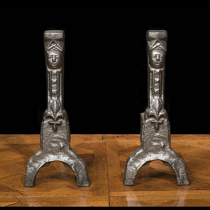 Jacobean pair of cast figural fire dogs