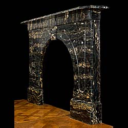 An Antique Portoro Marble Fireplace Surround