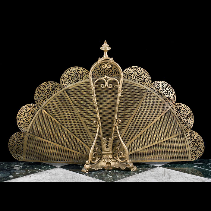 A Rococo Style Brass Peacock Fire Screen