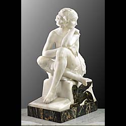  A fine statuary marble Art Deco figure of a young lady  