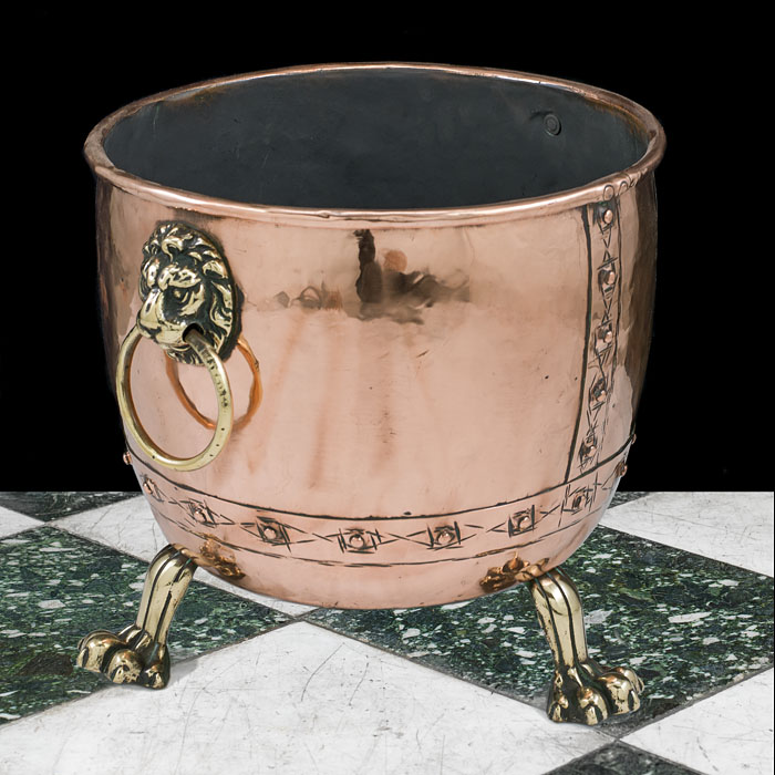 An antique Victorian lion mask copper log bin     