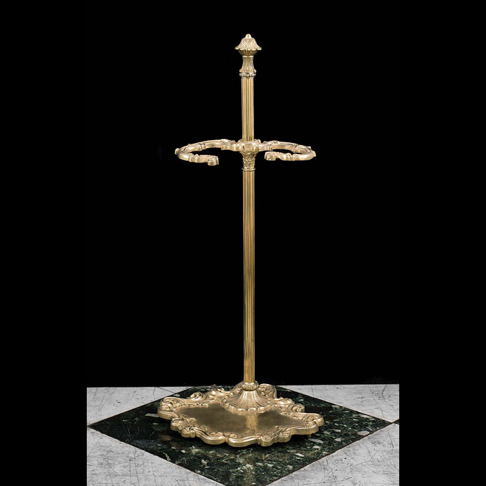 A Regency style brass antique fire tool stand    