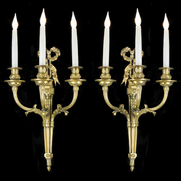 A Pair of Georgian Style Brass Wall Lights