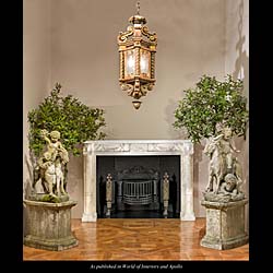 A Regency Carrara Marble Italian Fireplace