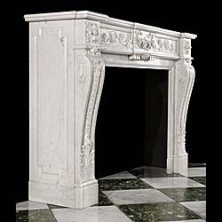 A Louis XVI Style Carrara Marble Fireplace 