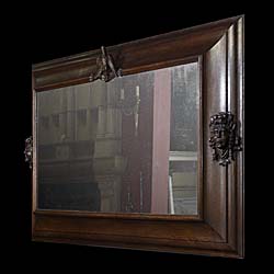 A Large French Oak Framed Overmantel Mirror