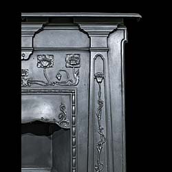 A Small Art Nouveau Cast Iron Fireplace