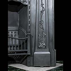 A Small Art Nouveau Cast Iron Fireplace