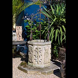  A 20th century reconstituted stone well head   