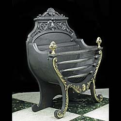 A Victorian Rococo Style Fire Basket