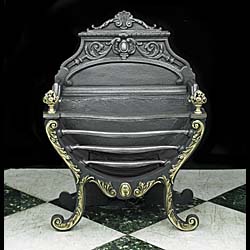 A Victorian Rococo Style Fire Basket