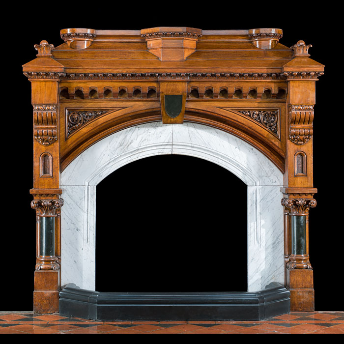 A Tall Gothic Revival Antique Oak Fireplace