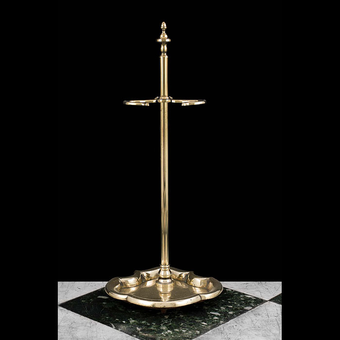 An early 20th century brass fire tool stand    
