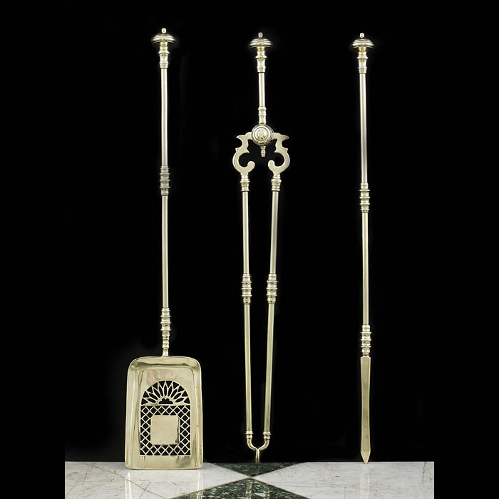  A Set of Brass Rococo Style Fire Irons