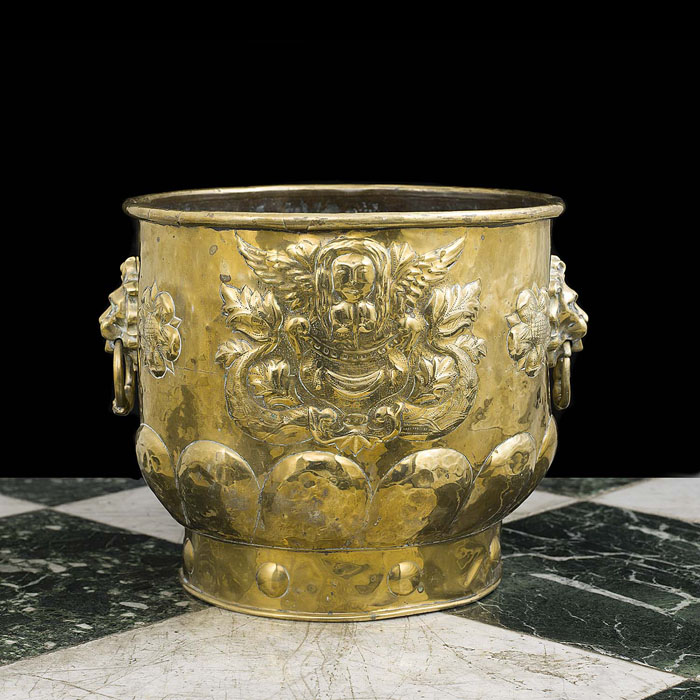  A Brass Repoussé Log Basket or Planter 