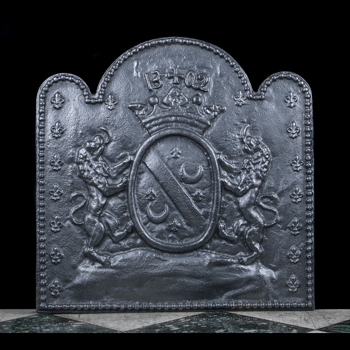 A large cast iron heraldic French fireback