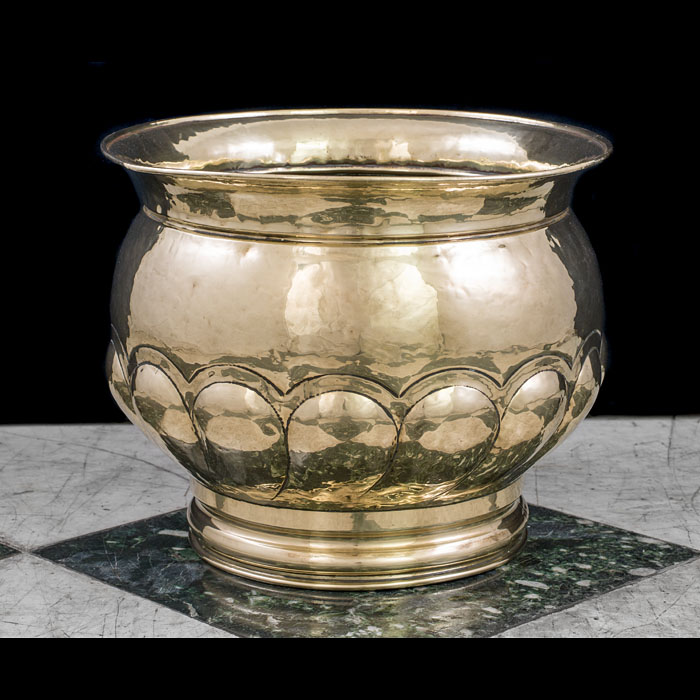 A gadrooned Victorian brass jardiniere 