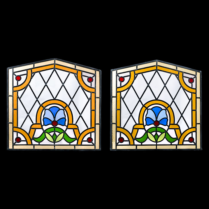 A decorative pair of stained glass panels