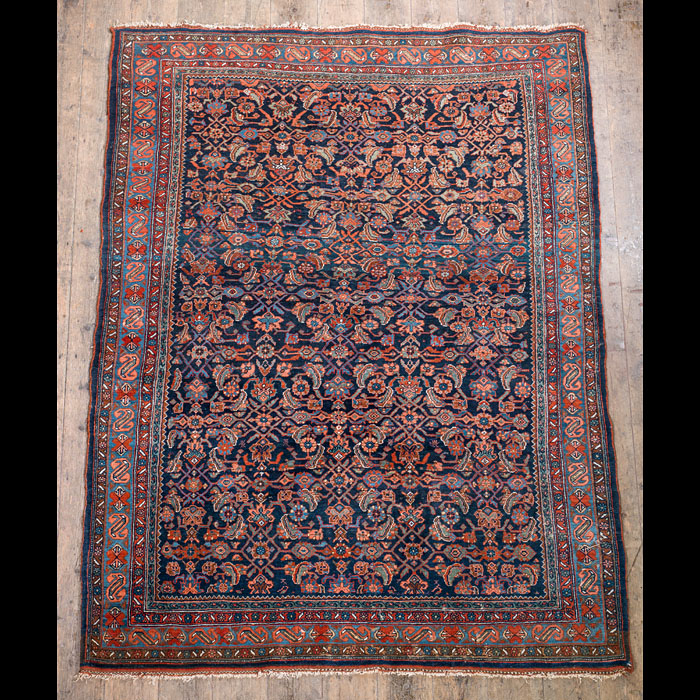 A Bidjar carpet dominated by floral motifs