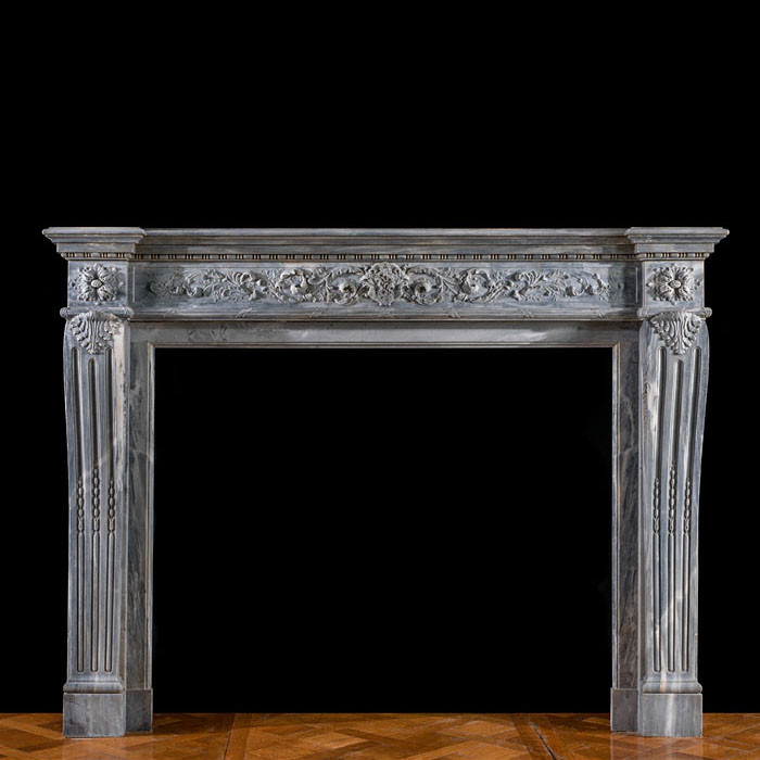 A Louis XVI grey marble chimneypiece 