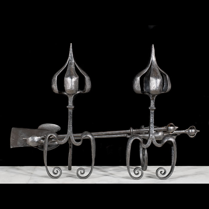 An Art Nouveau set of fire tools and rests
