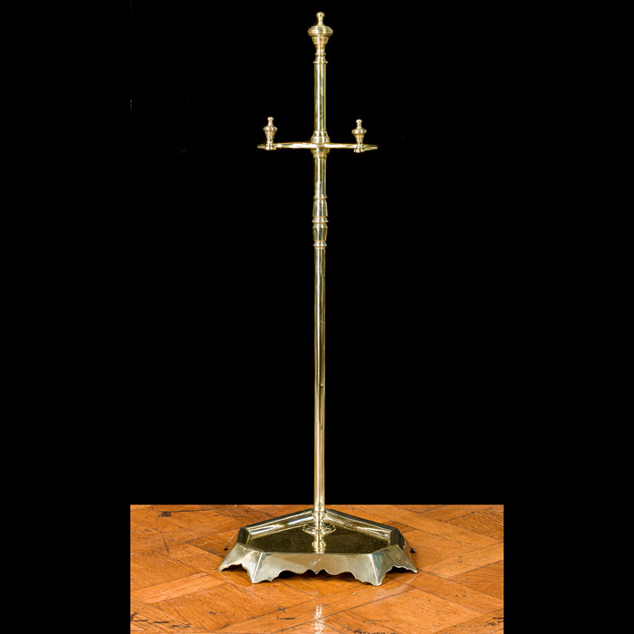 A brass Georgian etched firetool stand 