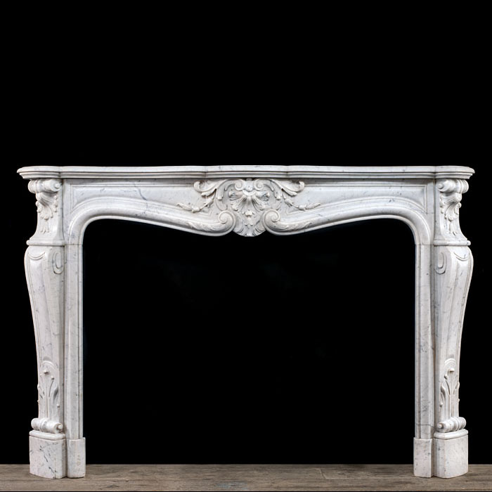 A Louis XV Rococo fireplace surround