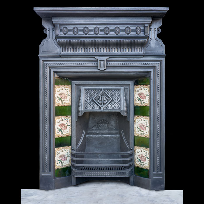 A Small Cast Iron Combination Fireplace 