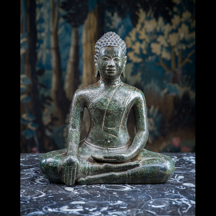A Sixteenth Century Bronze Buddha in Virasana