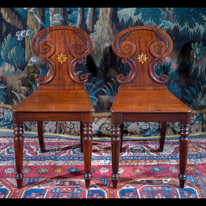 Pair of Mahogany Hall Chairs with Armorial Backs 