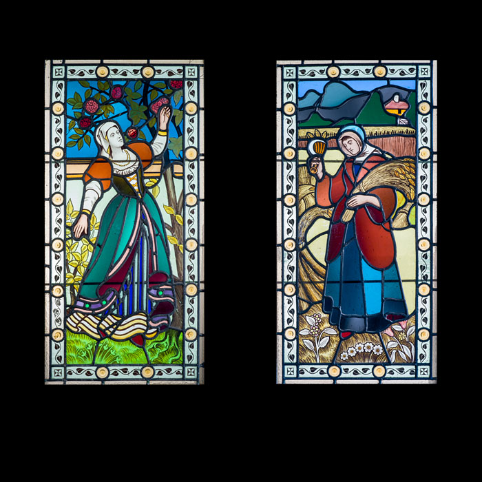 A Pair of Stained and Painted Window Panels 