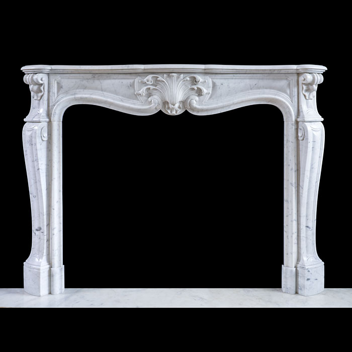 A French Carrara Marble Louis XV Rococo Fireplace