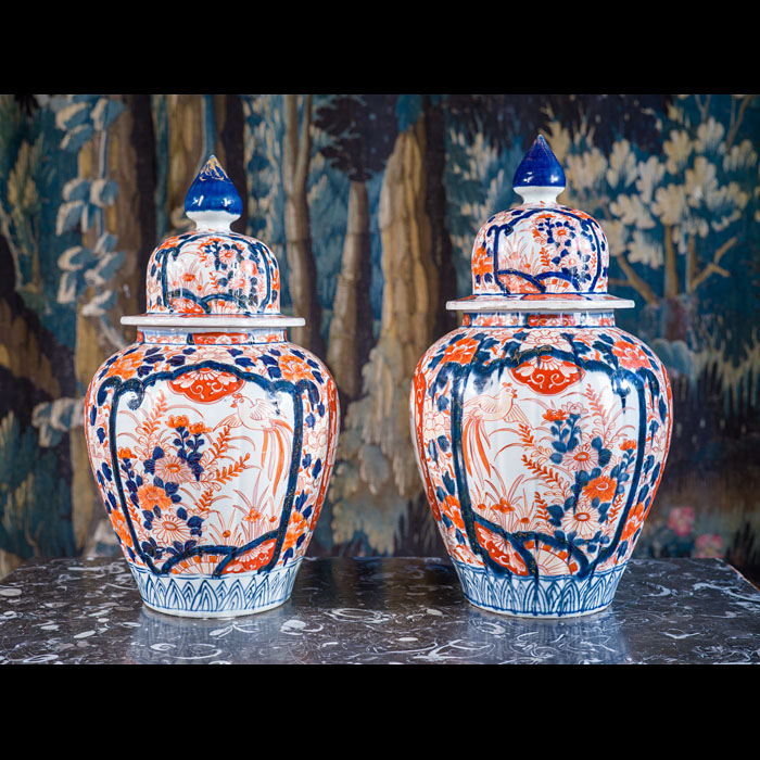 A Pair of Late Meiji Period Imari Porcelain Vases and Covers