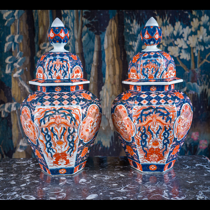 A Small Pair of Hexagonal, Late Meiji Period, Imari Lidded Vases