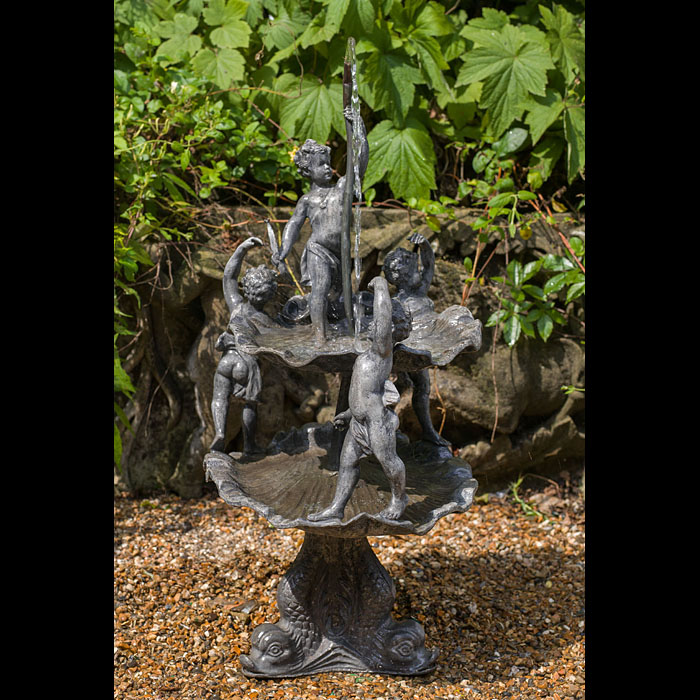 A replica small lead garden fountain