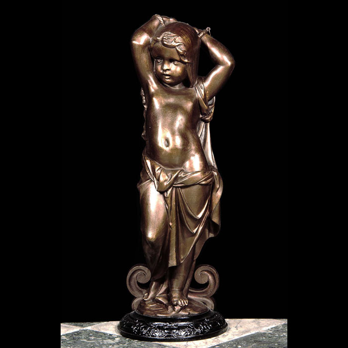 A Coalbrookdale Bronzed Iron 'Cosette' Figure