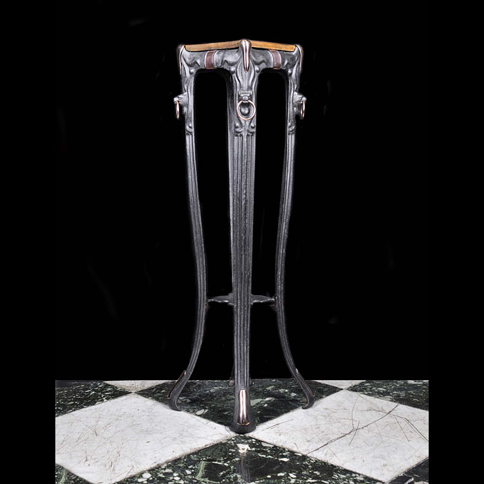 An Art Nouveau Cast Iron Wolf Plant Stand